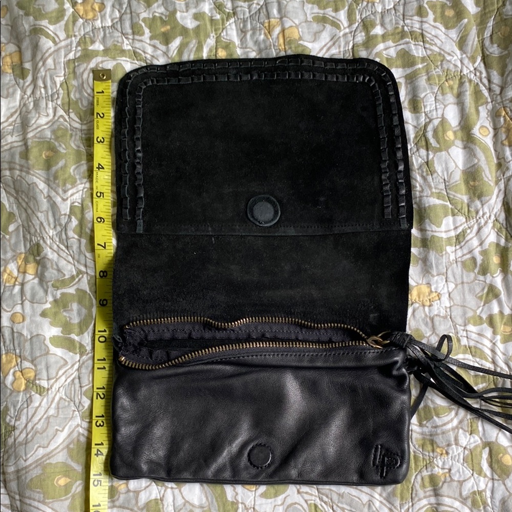 Linea Pelle Collecton Black Leather roll clutch